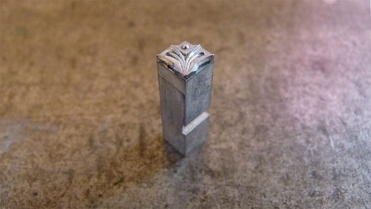 t042_glint_letterpress_ornament