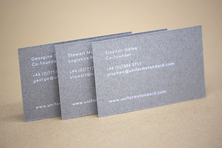uniform standard business cards white foil stamped recycled greyboard backs 750